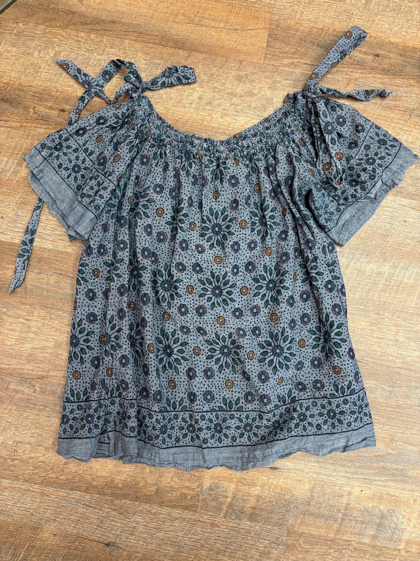 Blue ruffled floral top